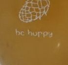 A close-up on the glass from the original image, showcasing the degraded text.