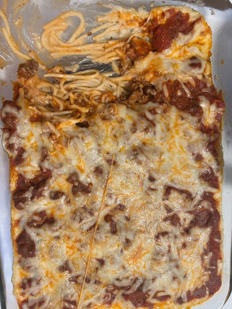 Baked spaghetti cheese on top 