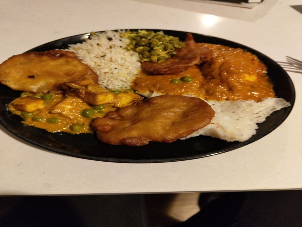 A plate of amazing curry ordered for me by the love of my life.