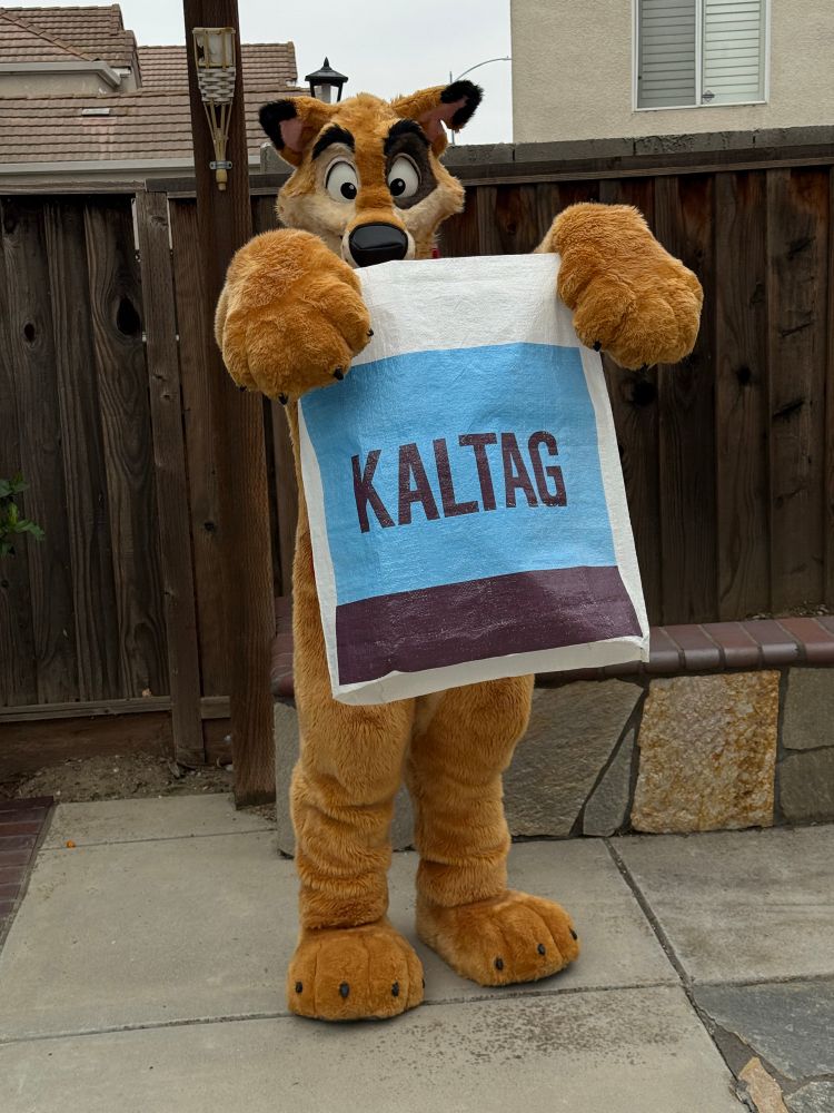 Kaltag holding out his bag for you!
Treats plz?