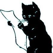 Black cat reading a copy of the Spurtle.