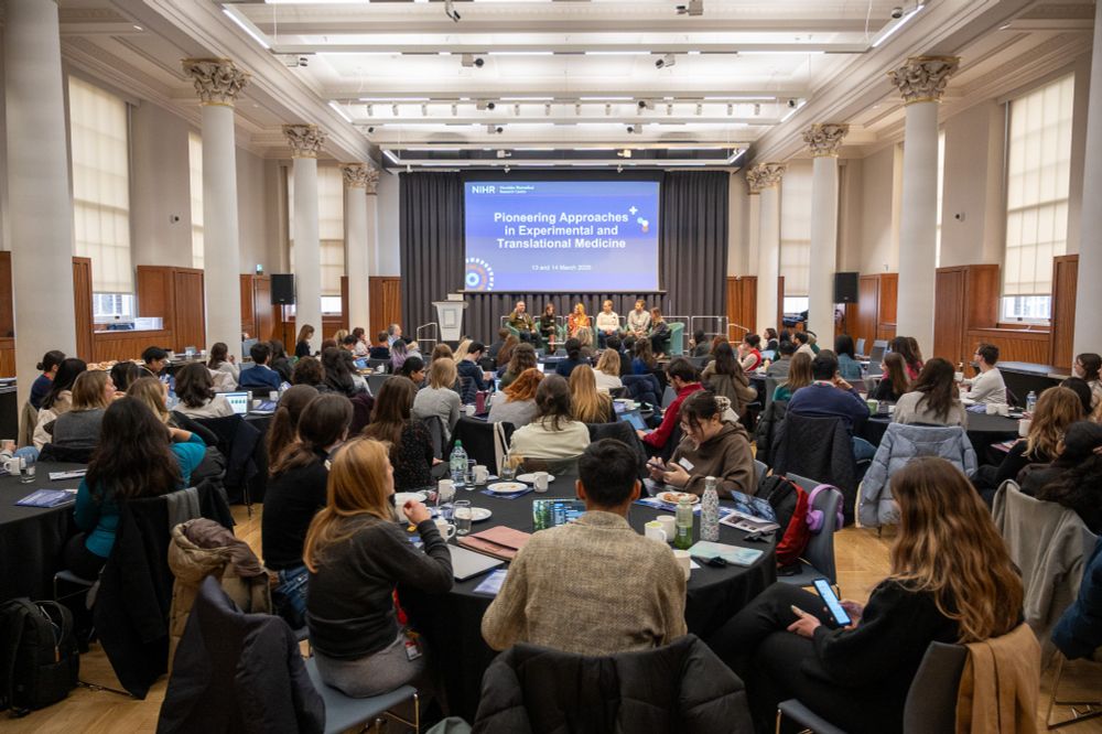 View of the whole room - over 100 people watching a panel