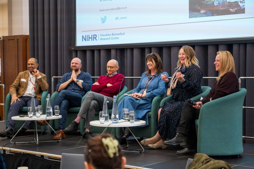 Panel discussion, people smiling