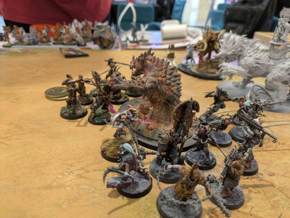 The lava beast conjured by the duardin ravages the savagers.