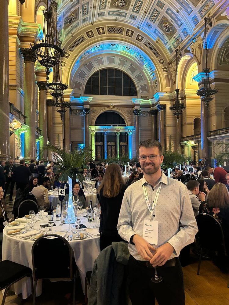 A person standing in St Georges Hall at the Gala dinner of the Biologists @ 100 conference.