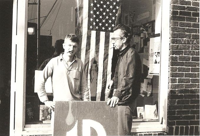 Floyd Turner (L) and Stan Iverson (R) in front of the ID bookstore in Seattle's University District.
