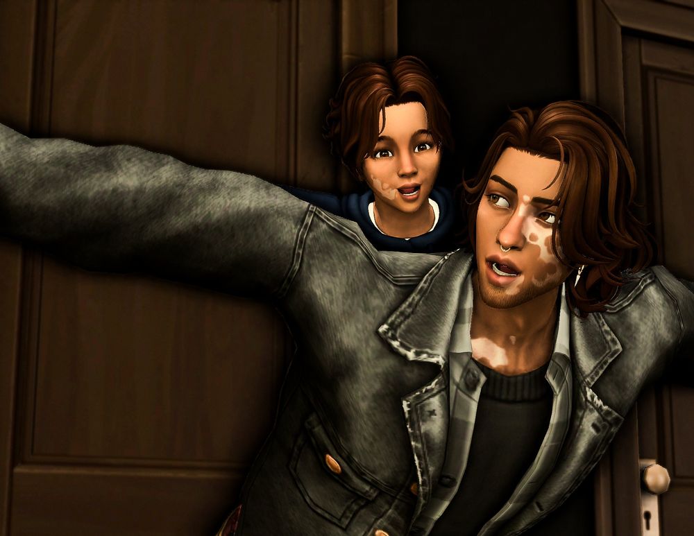 A toddler Dorian is on the back on his dad, Ryland Slade