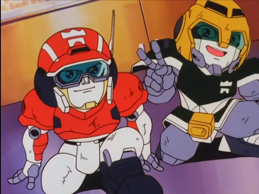 Screenshot from Iron Leaguer episode 36 of very battered Magnum and Windy kneeling and looking up at Amp as Windy flashes her a victory hand sign. 