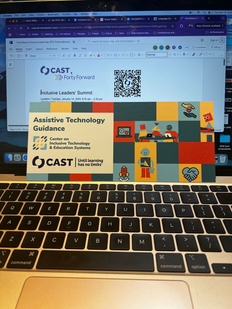 Image of my computer screen with summit agenda on screen  