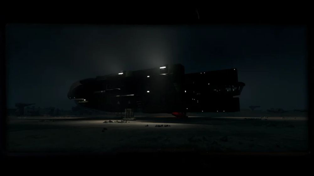 A photo from Starfield of a ship on a landing pad at night