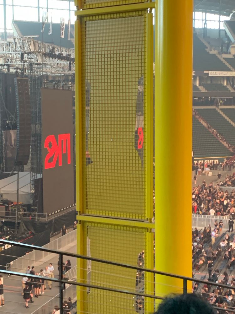 Picture of giant yellow beam blocking the view of the stage at Globe Life Park
