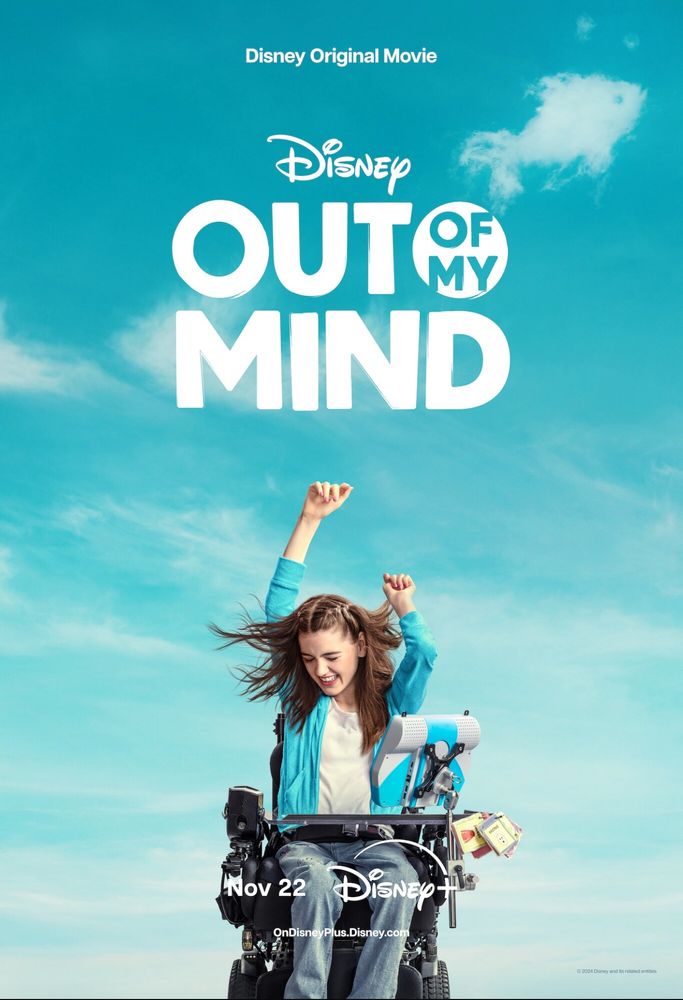 Movie poster featuring a young woman with light skin and brown hair in a power wheelchair, smiling with her arms raised in the air. The text reads “Disney Original Movie” and “Out of My Mind”