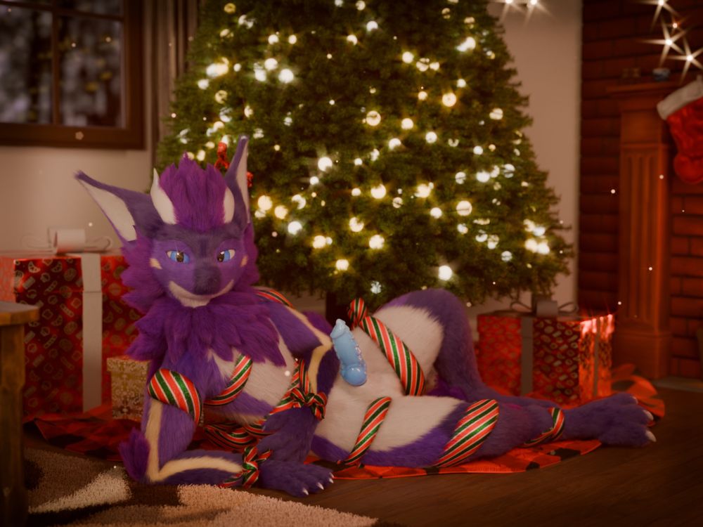 Nardo laying under Christmas tree