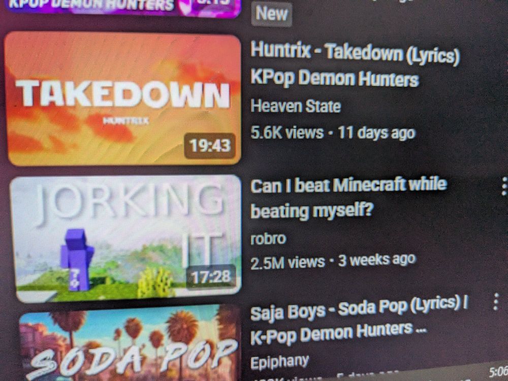 A YouTube video titled "Can I beat Minecraft while beating myself" with the words "JORKING IT" in the thumbnail 