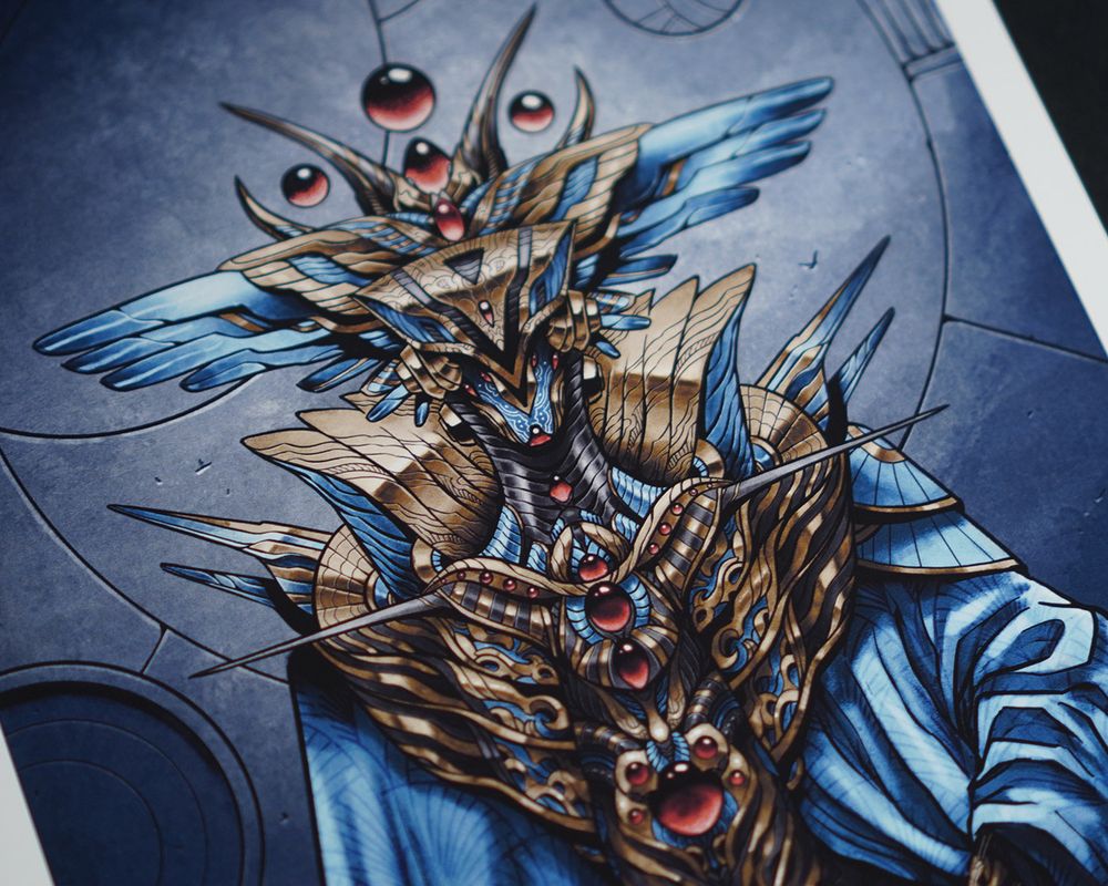 Photo showing a close-up of a printed illustration. It depicts a character who appears robotic or clad in some sort of armour, in a mixture of blue and gold tones.