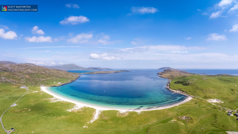 Aerial view of Traigha Bhaigh beach on the Isle of Vatersay in the Western Isles of Scotland.
