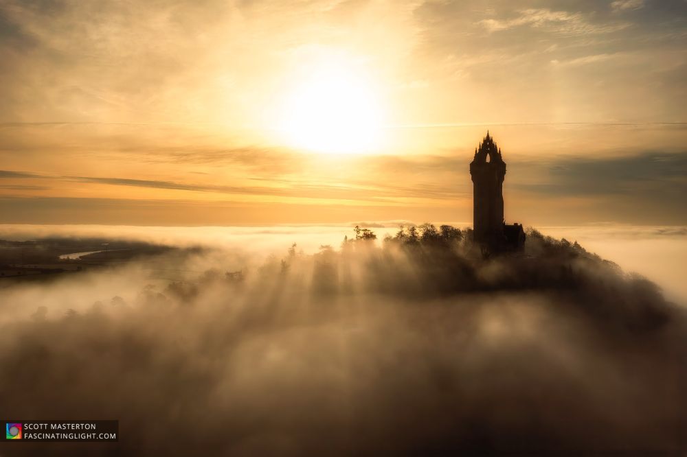 National Wallace Monument rising through an early morning fog