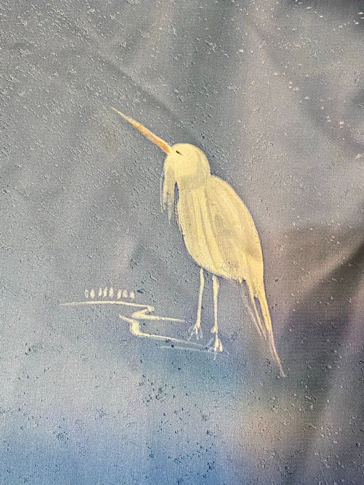 裾の鷺。一羽。