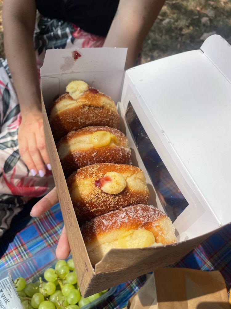 4 doughnuts- 2 custard, 2 berry jam, all delicious 