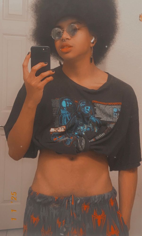 karma posing in the mirror in pj's