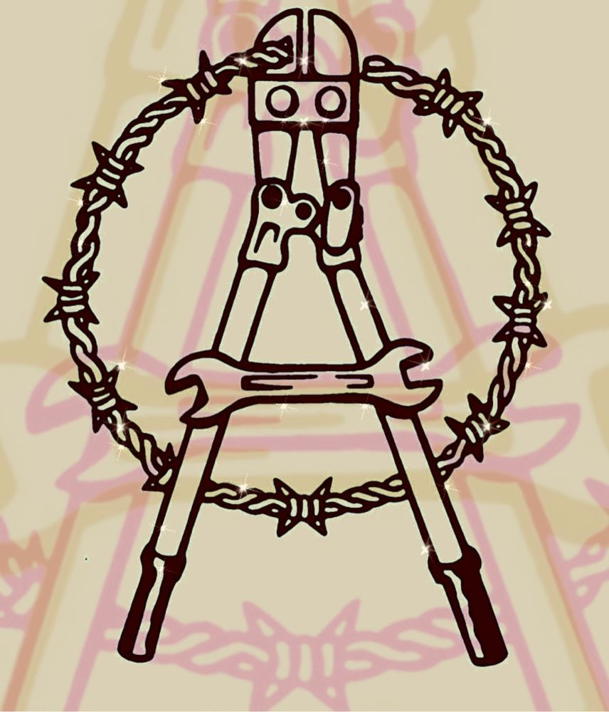 The Anarchy circle A with the circle made of barbed wire and the A made with wire cutters and a wrench.