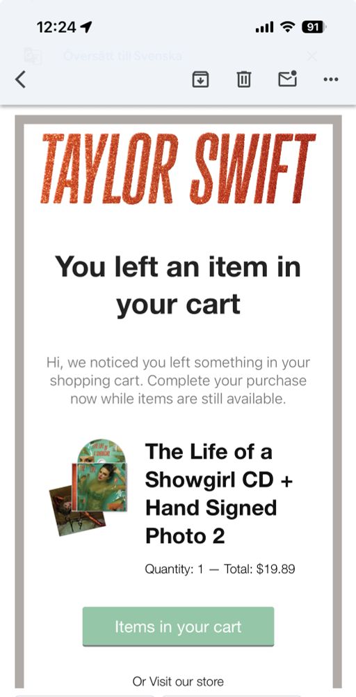 Email from the Taylor Swift store with the heading: ”you left an item in your cart” and email body: ”hi we noticed you left something in your shopping cart…” and the item being the signed CD with photo 2