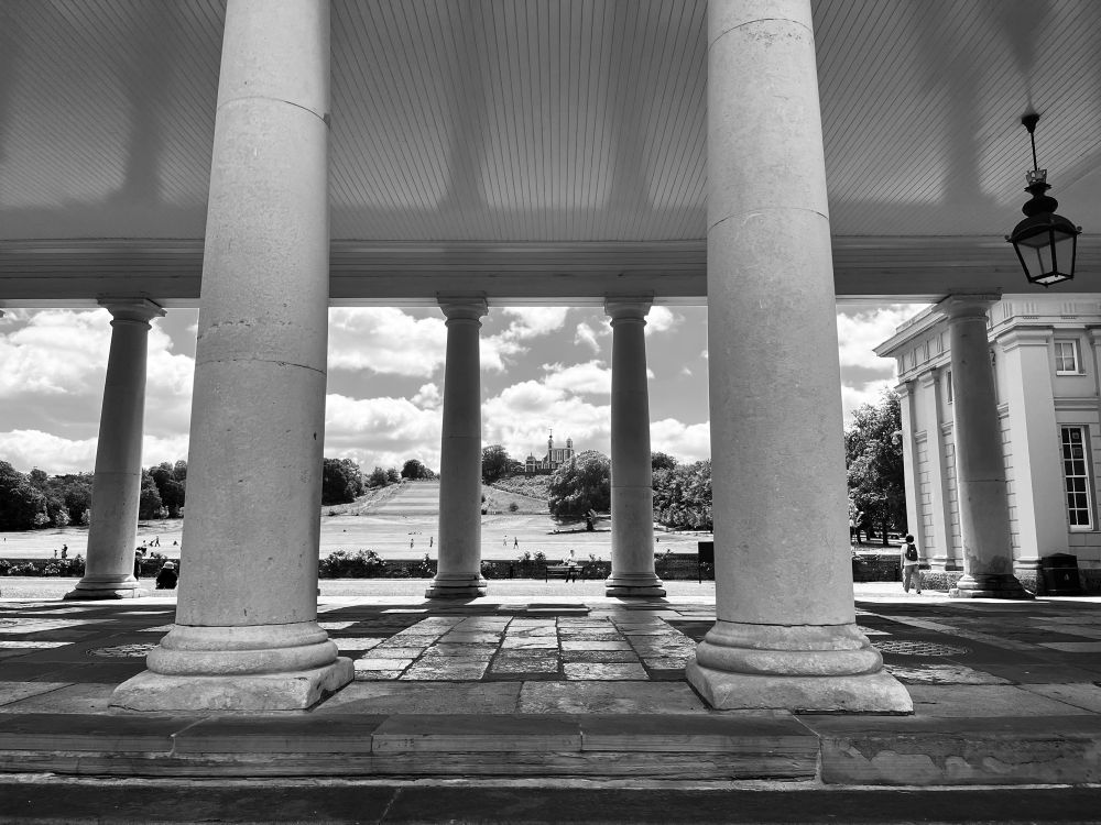 Columns with building in background 
