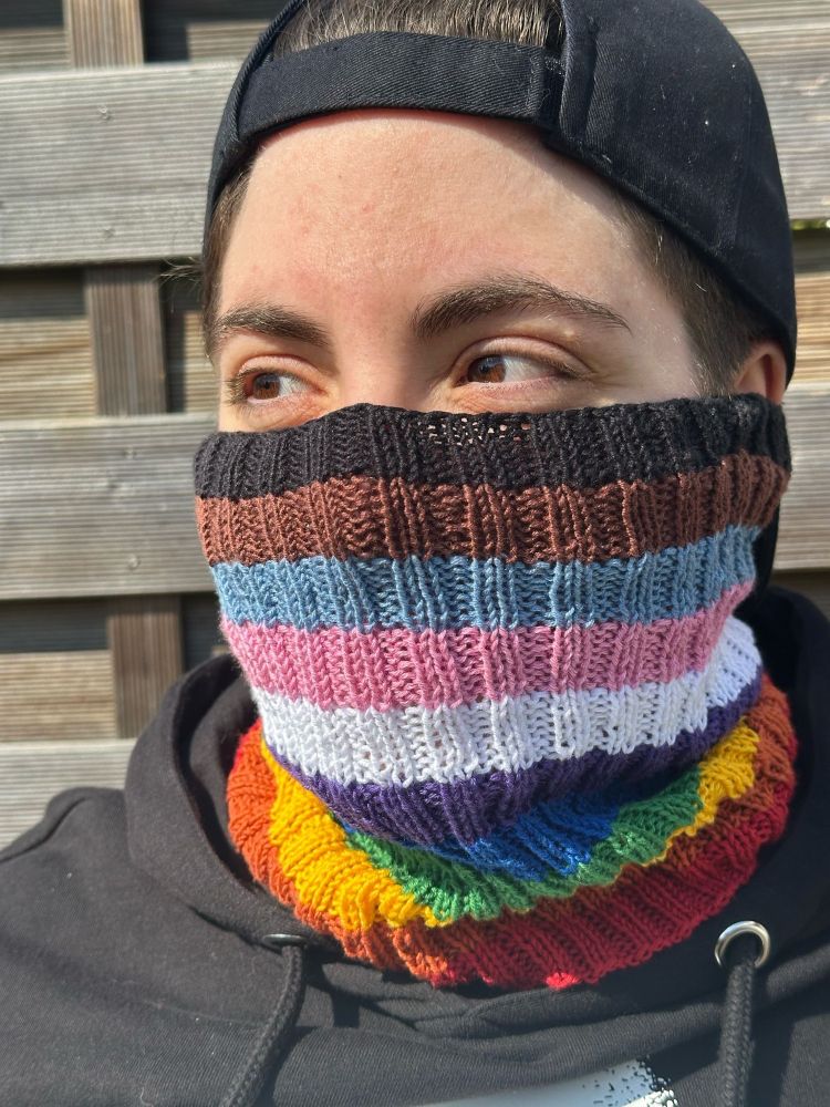 Neck gaiter in progress-pride colours, by Ceylan Stafford-Bloor