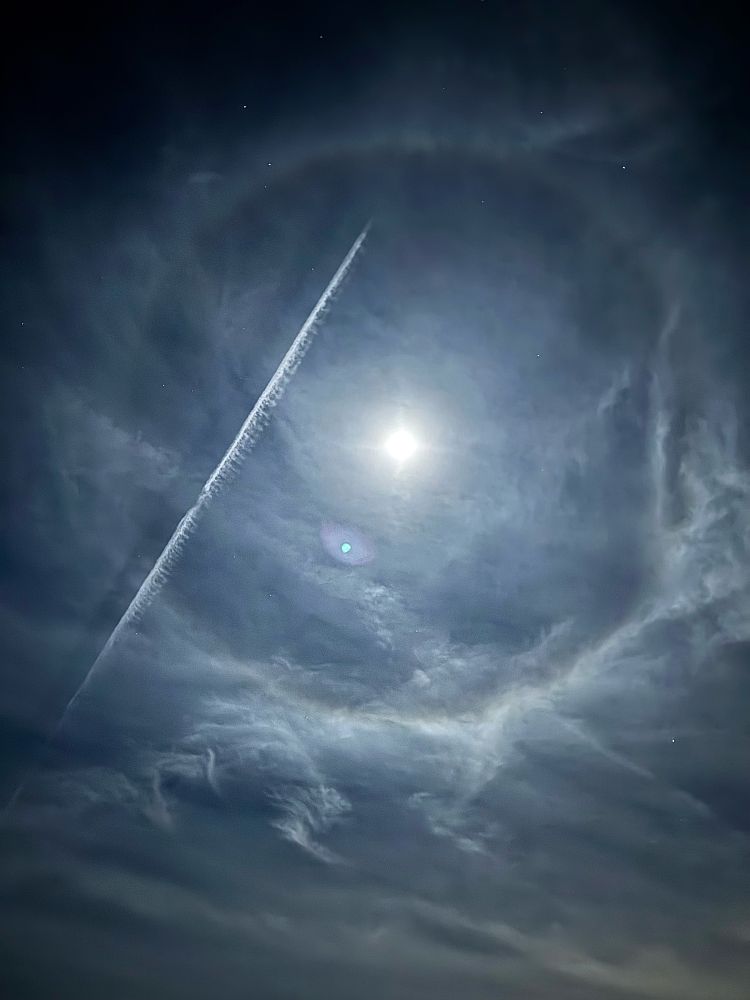 Night sky view with Moon and clouds