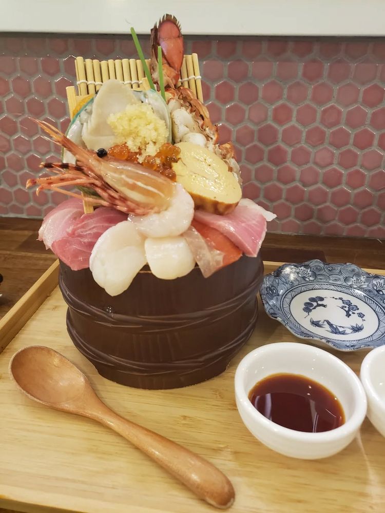 A giant bowl of sashimi, including lobster, spot prawn, blue fin tuna, sea urchin, salmon, yellowtail and more 