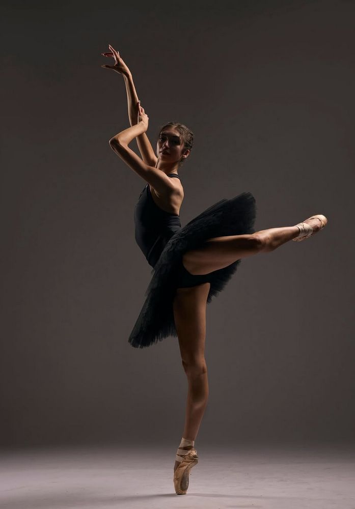 Ballerina Carmen Callahan in mid pose. 