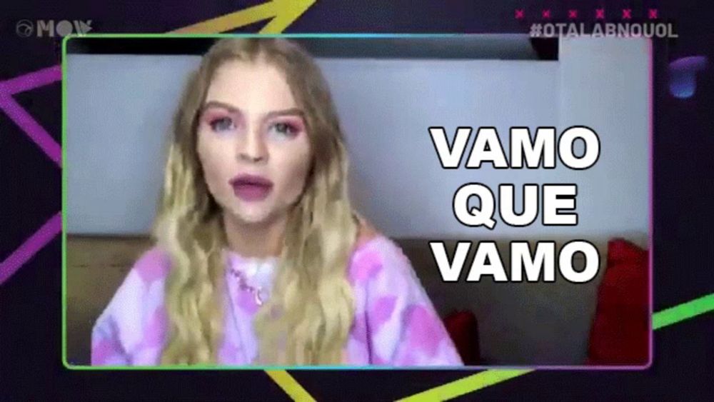 a woman in a pink tie dye shirt says " vamos que vamo "