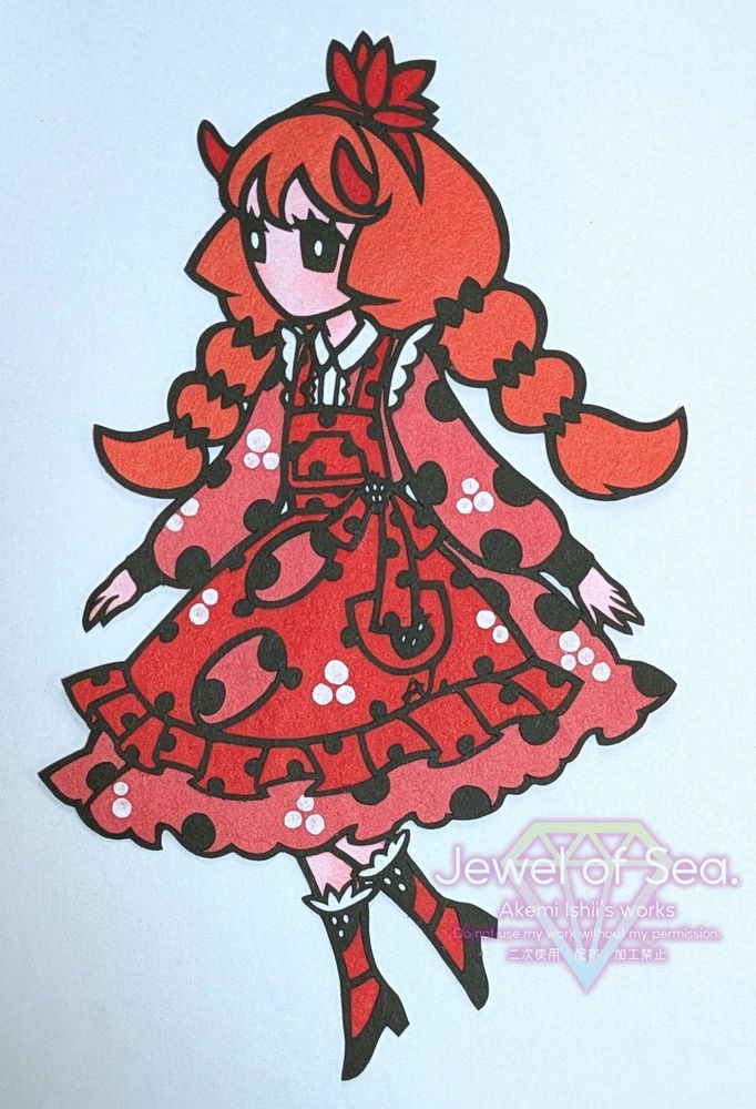 イチゴジャムウミウシをイメージした女の子の切り絵作品。