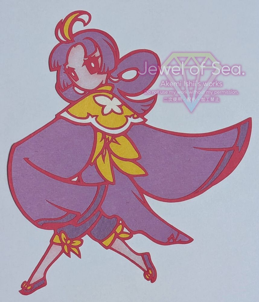 ムラサキウミコチョウをイメージした女の子の切り絵作品。