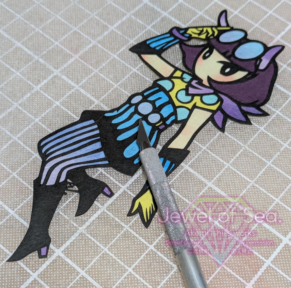 ボブサンウミウシをイメージした女の子の切り絵作品。