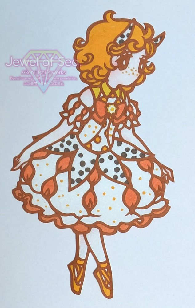 コンペイトウウミウシをイメージした女の子の切り絵作品。