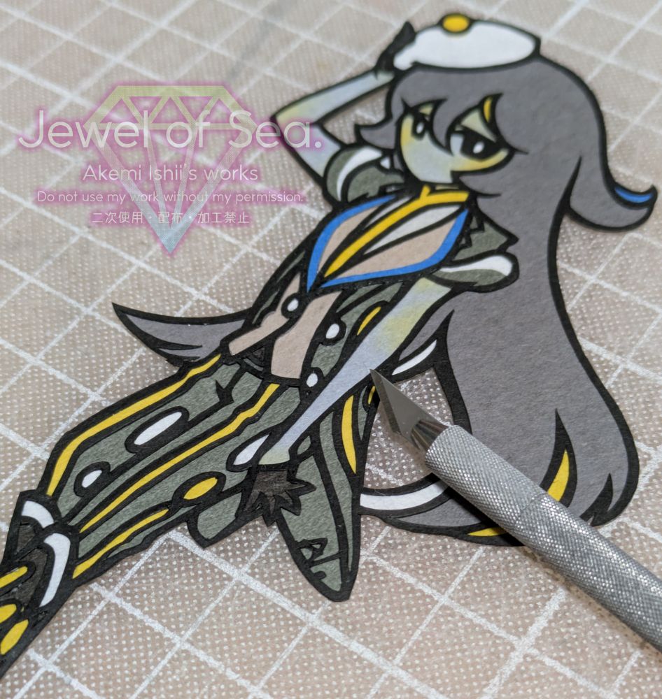 カラスキセワタをイメージした女の子の切り絵作品。