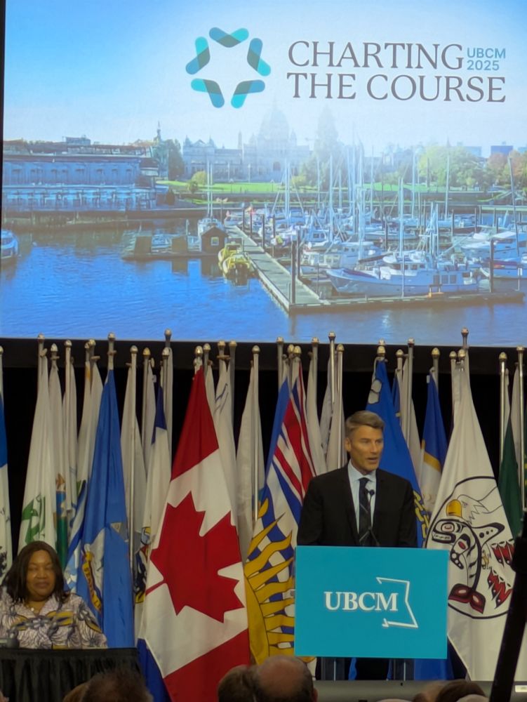 Image of Housing Minister Robertson speaking