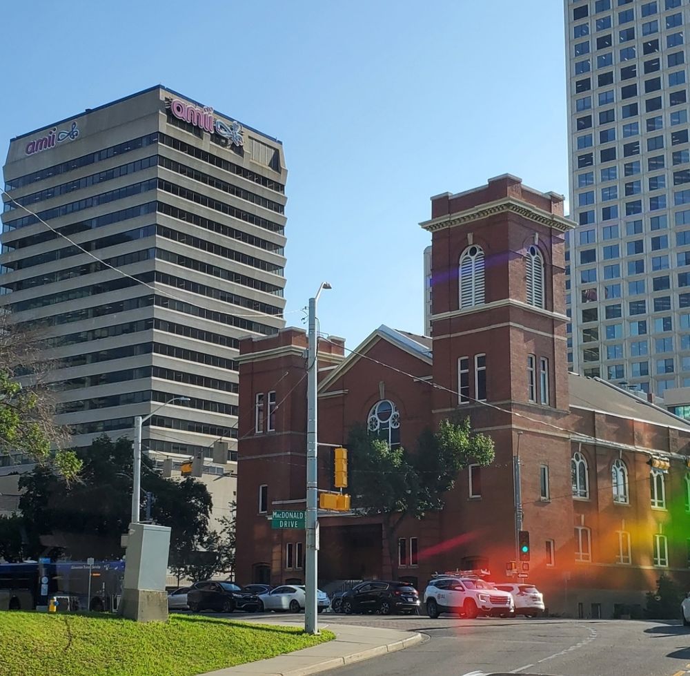 McDougall United Church stands beside AMII in contrast in style and intent