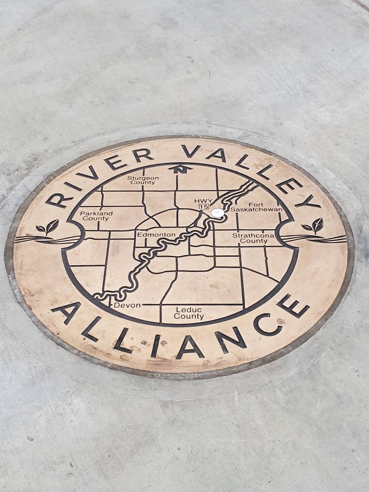 Plaque on the footbridge that says "River Valley Alliance"