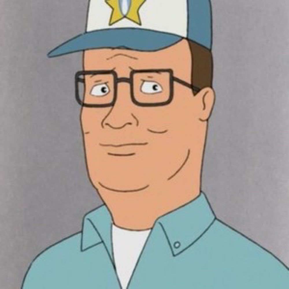 Food writer Hank Hill, wearing propane salesman hat + presumably full uniform