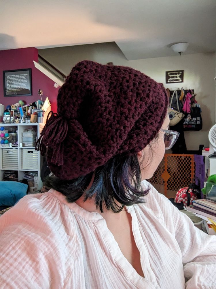 Awkward photo of the back of my head. I'm wearing a slouchy hat I crocheted out of deep burgundy yarn.