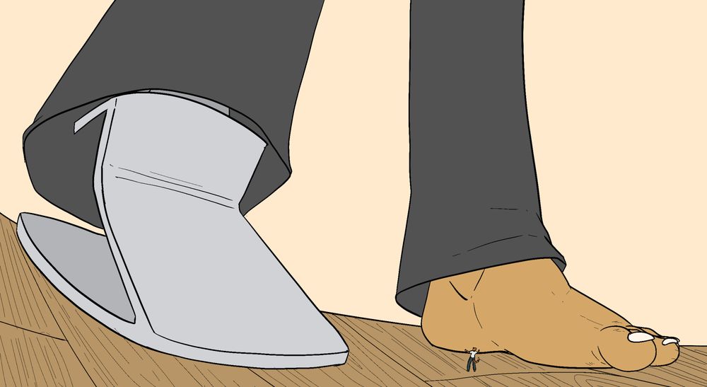 An almost imperceptible Bill is seen at the feet of Louis. One bare foot is visible to Bill's right, and to his left is Louis' prosthetic foot. There is nothing that indicates Louis knows Bill is there. 