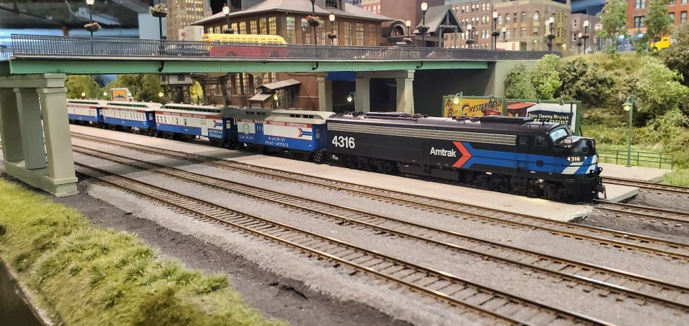 Amtrak Day One E-8 pulling AmWoods into Allentown.