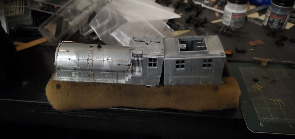 2/3rds of an HO scale MTH Milwaukee Bipolar locomotive, stripped of paint