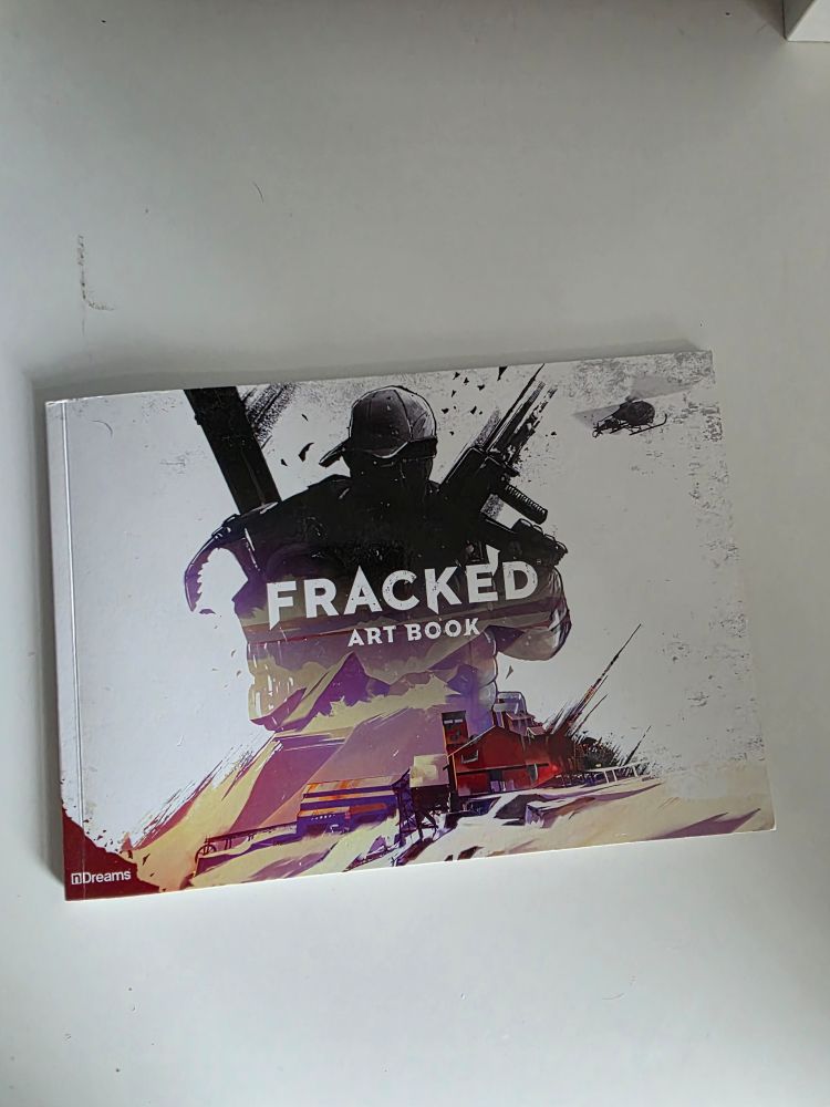 A rare physical art book from Fracked the video game.