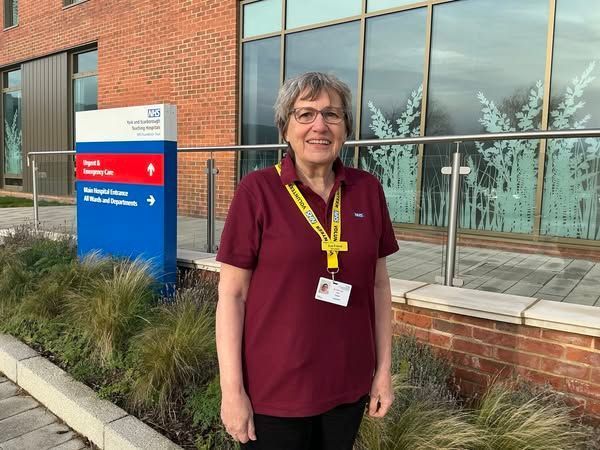 A volunteer outside Scarborough Hospital.