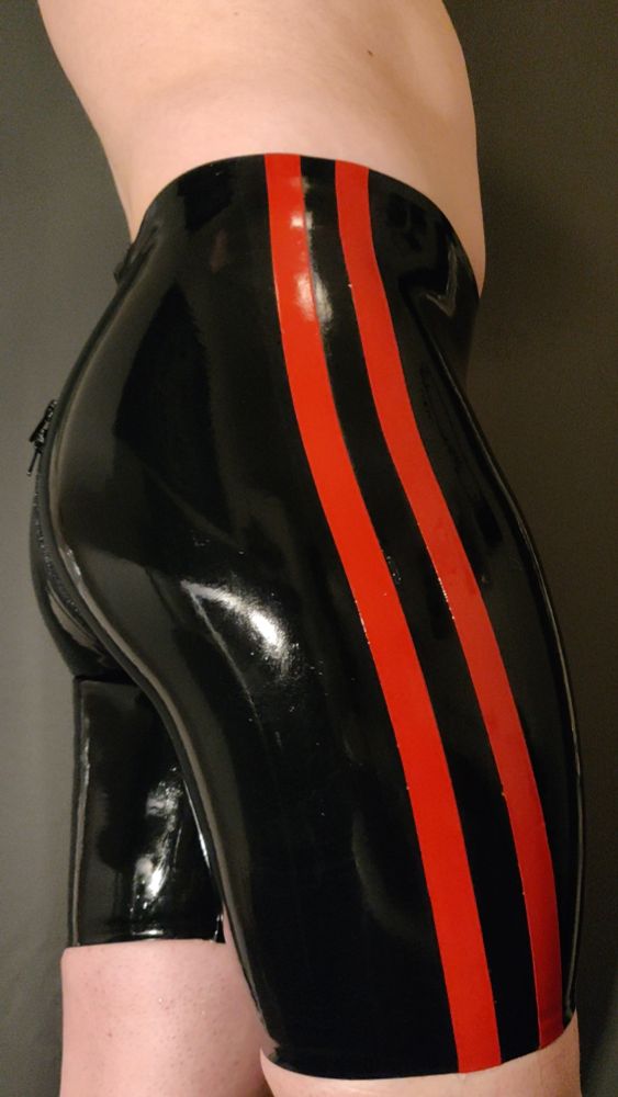 Tight and shiny rubber shorts