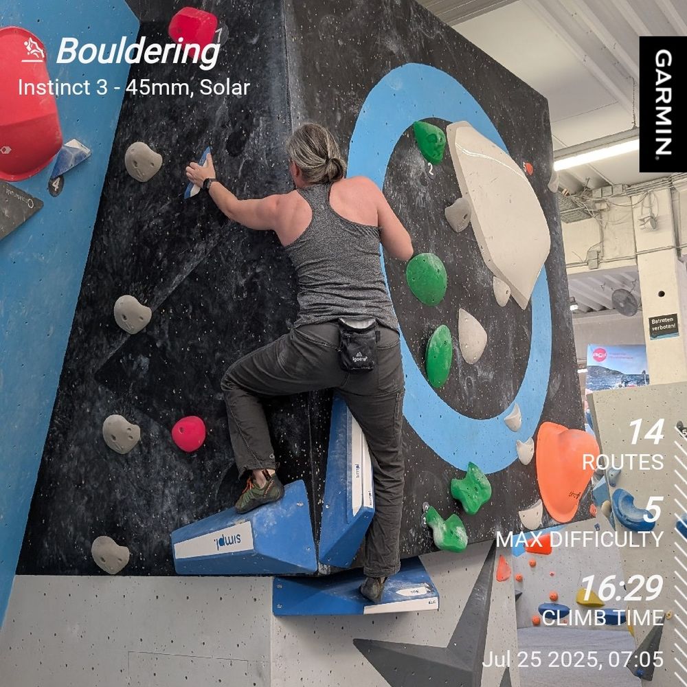 Me moving around a corner on a green route. 

Stats overlay shows 14 routes, max difficulty of 5 and 16:29 climb time.