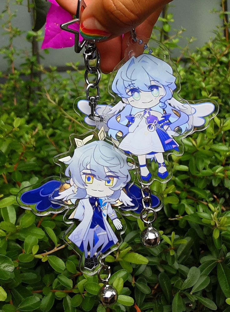 Acrylic keychains of Sunday and Robin (HSR)